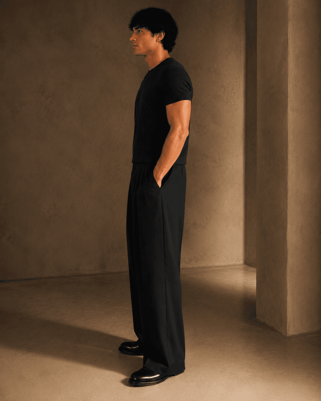 Polo Muscle Fit Crop negro vista posterior